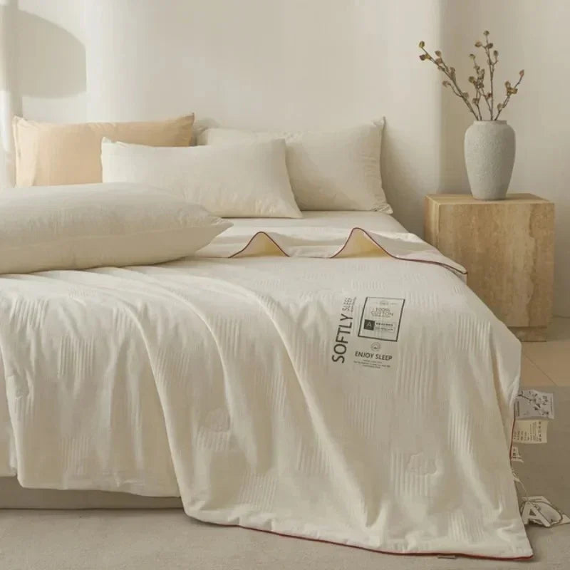 Jacquard Quilt Bedding with Woven Pattern in Four Fill Weights and Two Bed Sizes