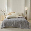 Jacquard Quilt Bedding with Woven Pattern in Four Fill Weights and Two Bed Sizes