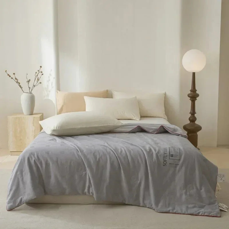 Jacquard Quilt Bedding with Woven Pattern in Four Fill Weights and Two Bed Sizes